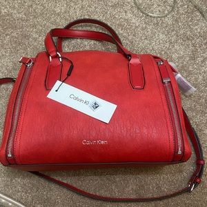 NWT Calvin Klein Handbag. Perfect for the holidays or anyone who loves red